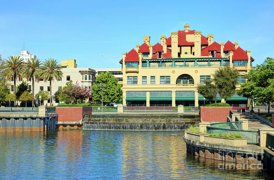 Here's an alt tag for the image: Stockton waterfront building and canal.